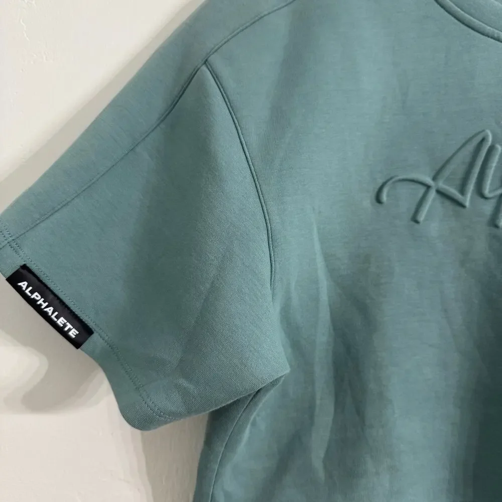 Alphalete Woman’s ELMTS Short Sleeve Crop Top Teal Blue Size Small
